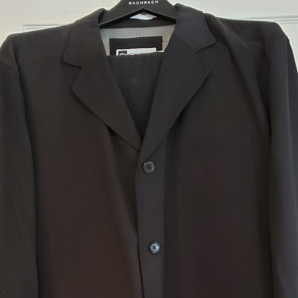 2 Men's suits. Both suits sold together.